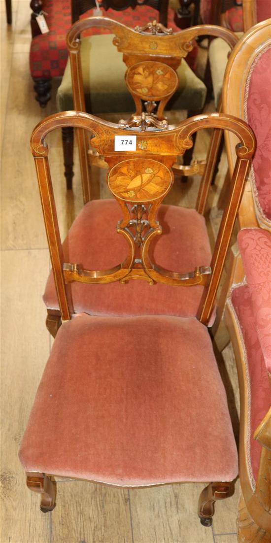 A pair of Edwardian inlaid mahogany boudoir chairs